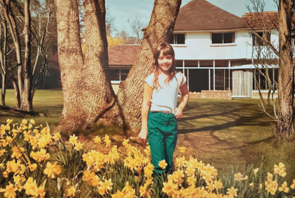 Bianca Best as a child in daffodils