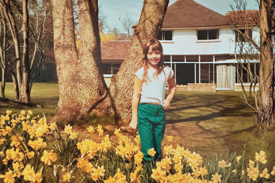Bianca Best as a child in daffodils
